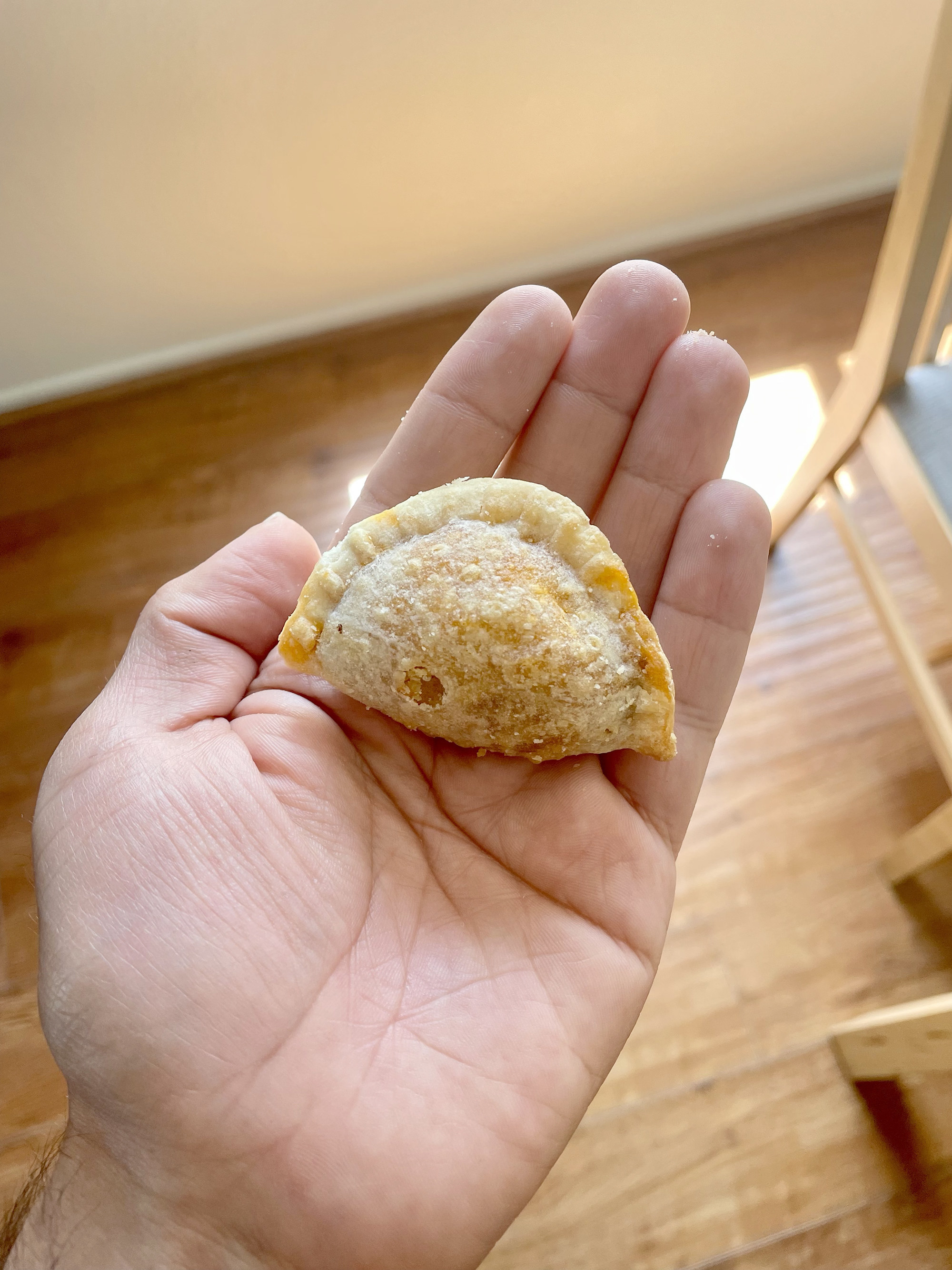 An empanada in the author&#x27;s hand