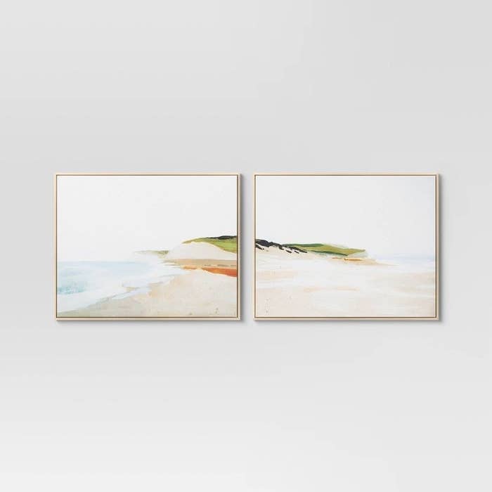 The set of two landscape prints on the wall