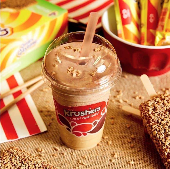 A Golden Gaytime KFC Krusher on a table with Golden Gaytime ice creams behind it