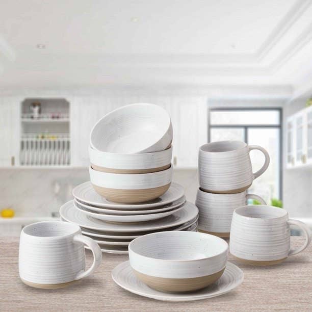 White and ceramic dinnerware set on a kitchen counter