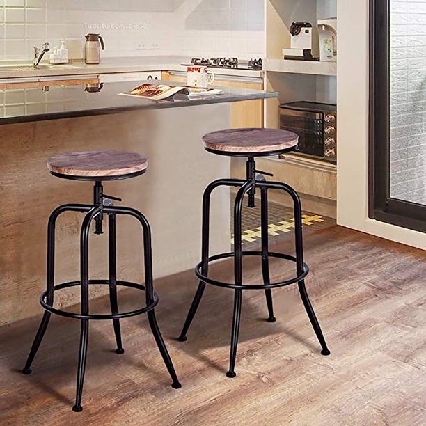 Metal and wood barstools by a kitchen island