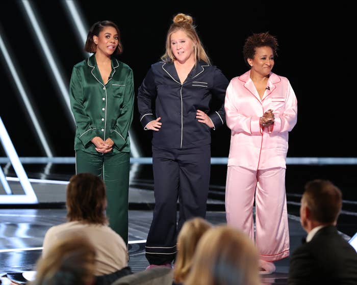 Regina Hall, Amy Schumer, and Wanda Sykes in pajamas, hosting the 2022 Oscars.