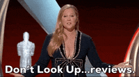 Amy Schumer saying, &quot;Don&#x27;t Look Up... review.&quot;