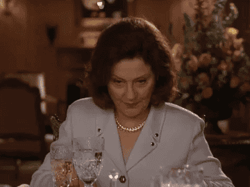 Emily Gilmore eating dinner while looking unamused