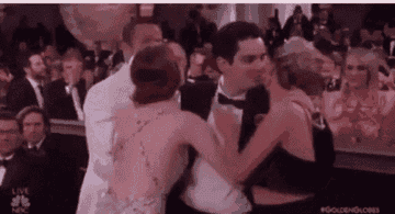 Damien Chazelle ignoring Emma Stone&#x27;s hug.