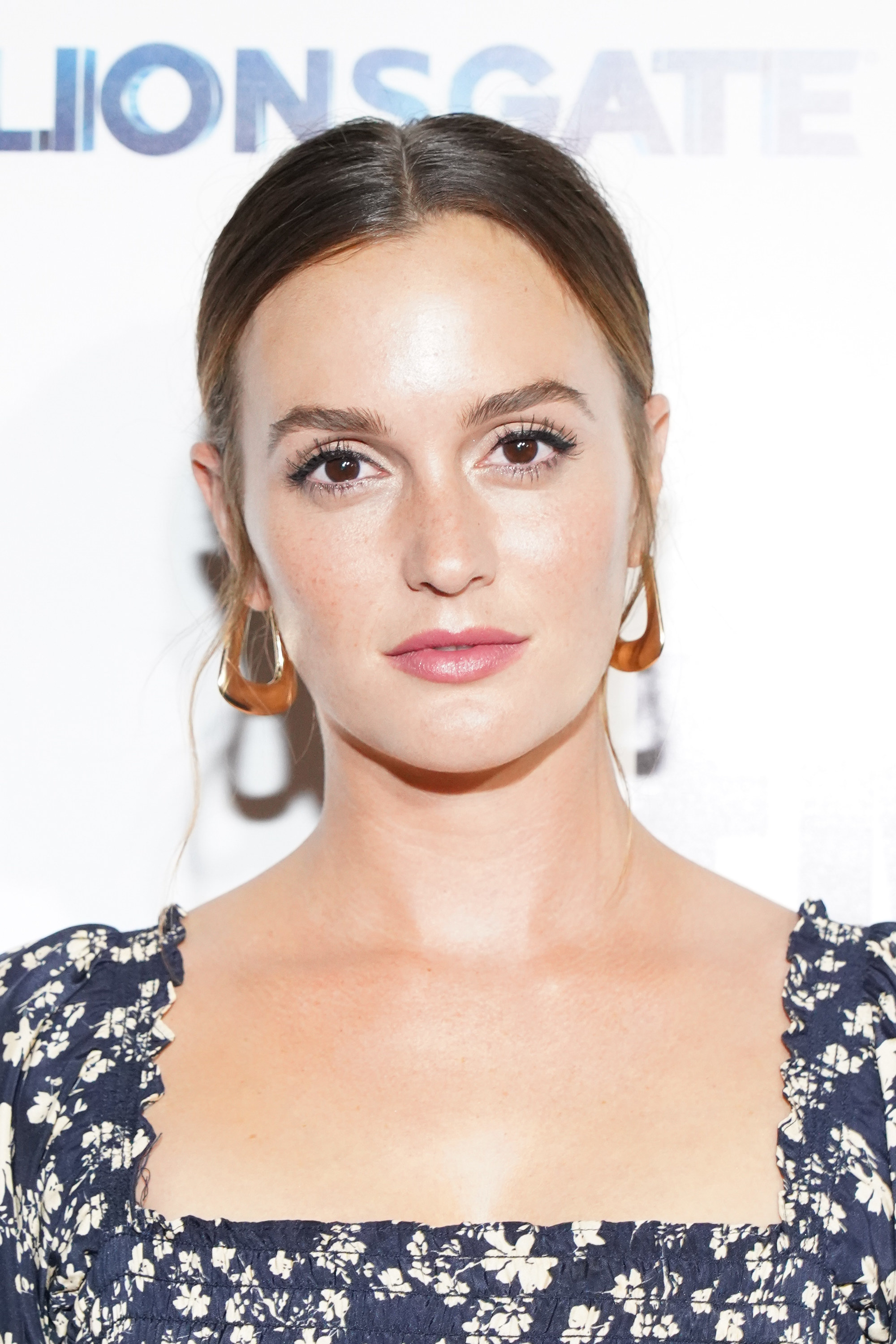 A close-up of Leighton Meester posing on the red carpet