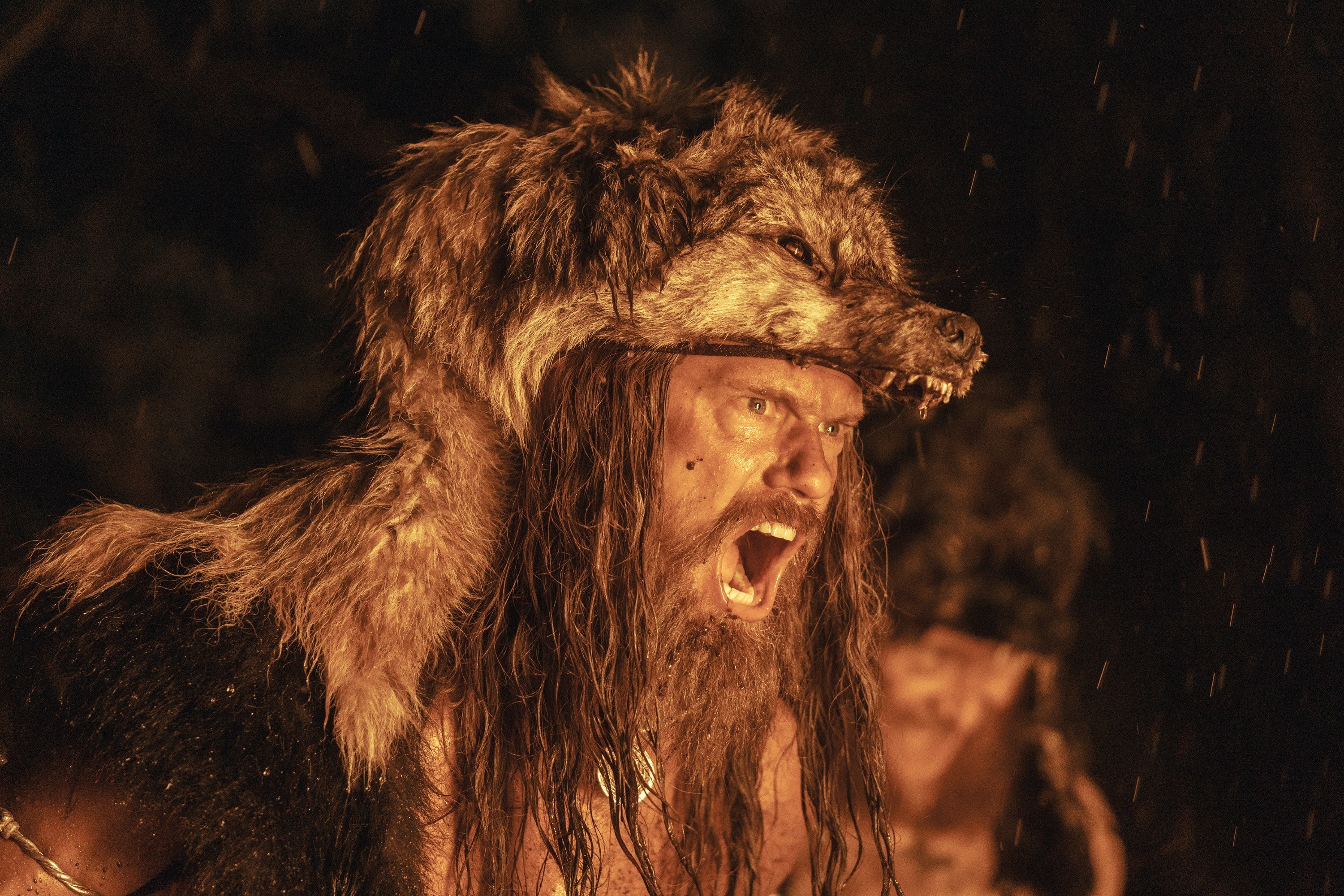 Berker warrior screaming in battle, wearing a helmet made of bear skin