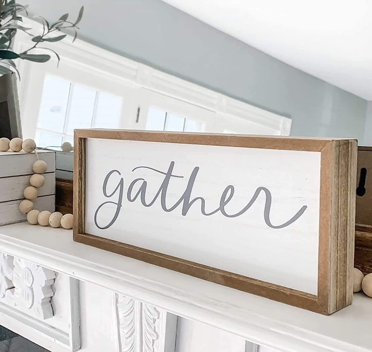 Sign in a room that says &quot;gather&quot;