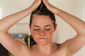 Emma Stone in the shower shaping her hair into a mohawk as Olive in Easy A