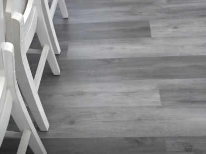 gray vinyl flooring in a kitchen next to bar stools