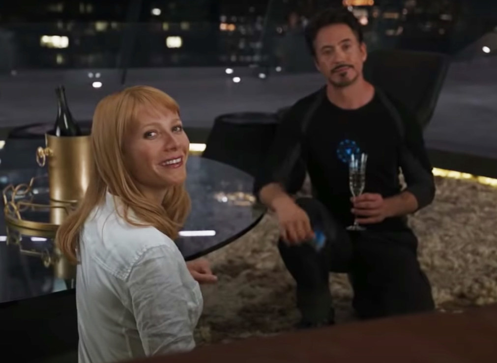 Tony and Pepper drinking champagne together