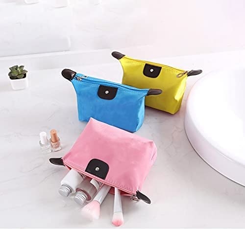 a set of waterproof makeup pouches on a bathroom vanity