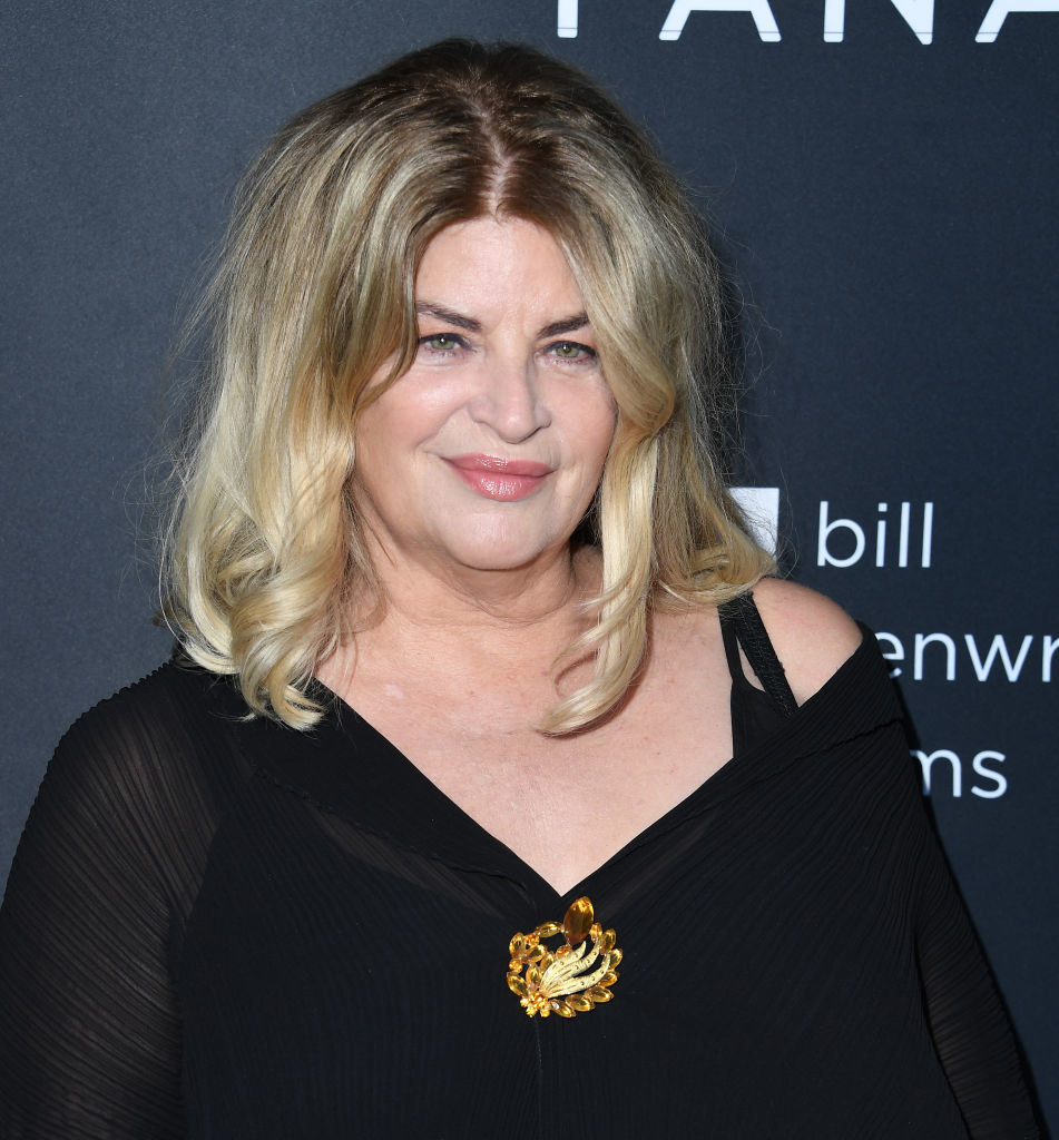 Kirstie Alley smiles at an event