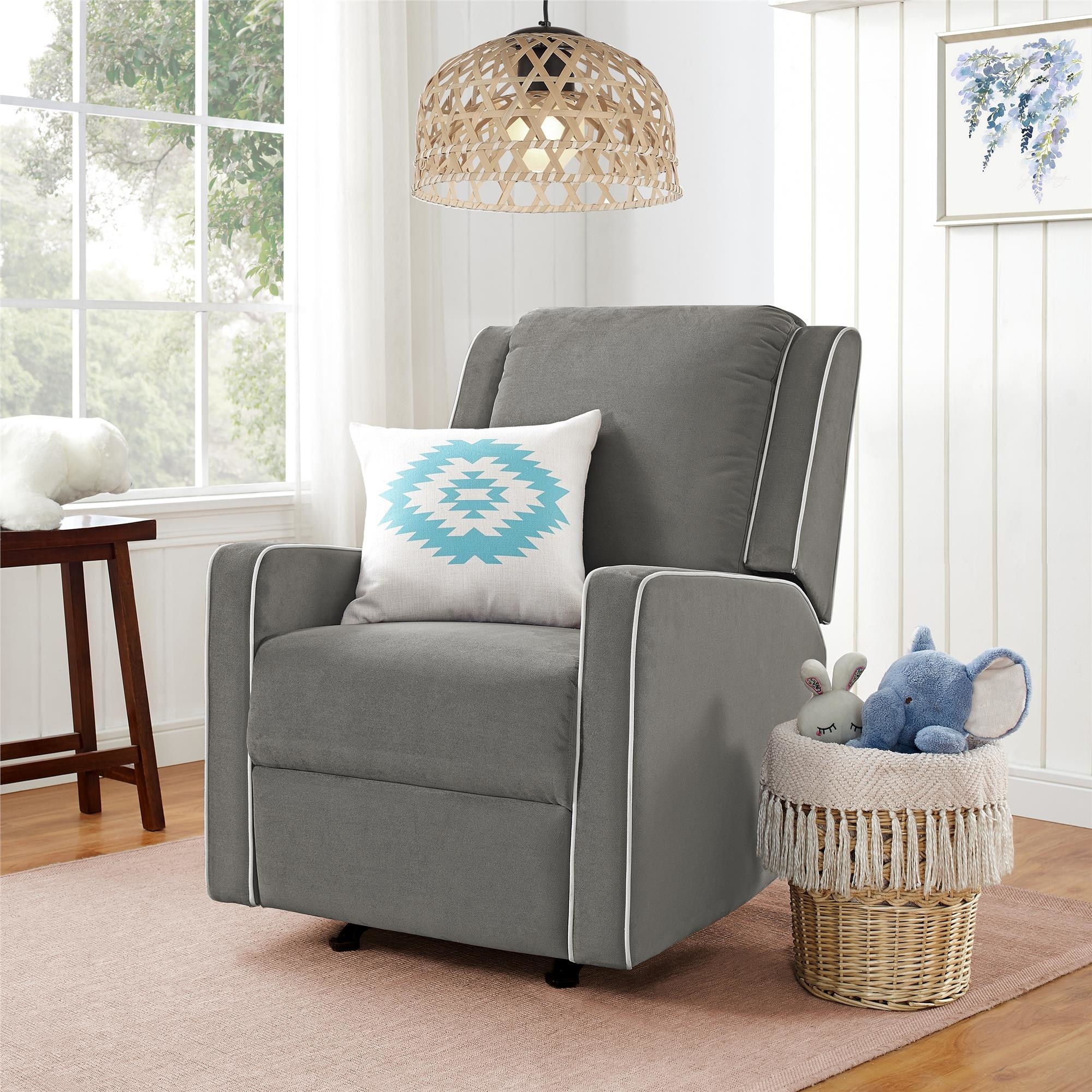 An image of a grey rocker recliner chair with a square sillouhette, smooth rocking mechanism, and pocket coil seat cushion