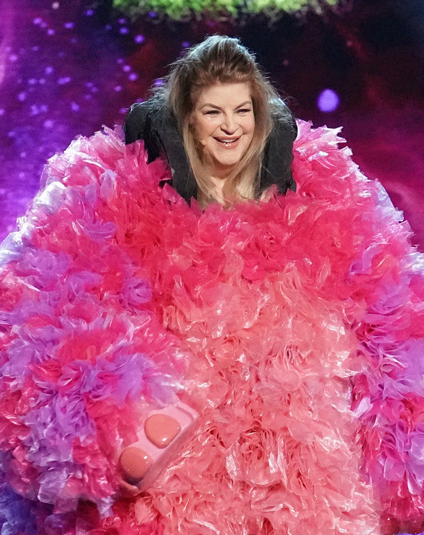 Kirstie Alley laughs in the baby mammoth costume