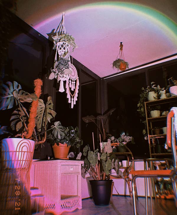 a reviewer's image of the lamp shining a light on a room