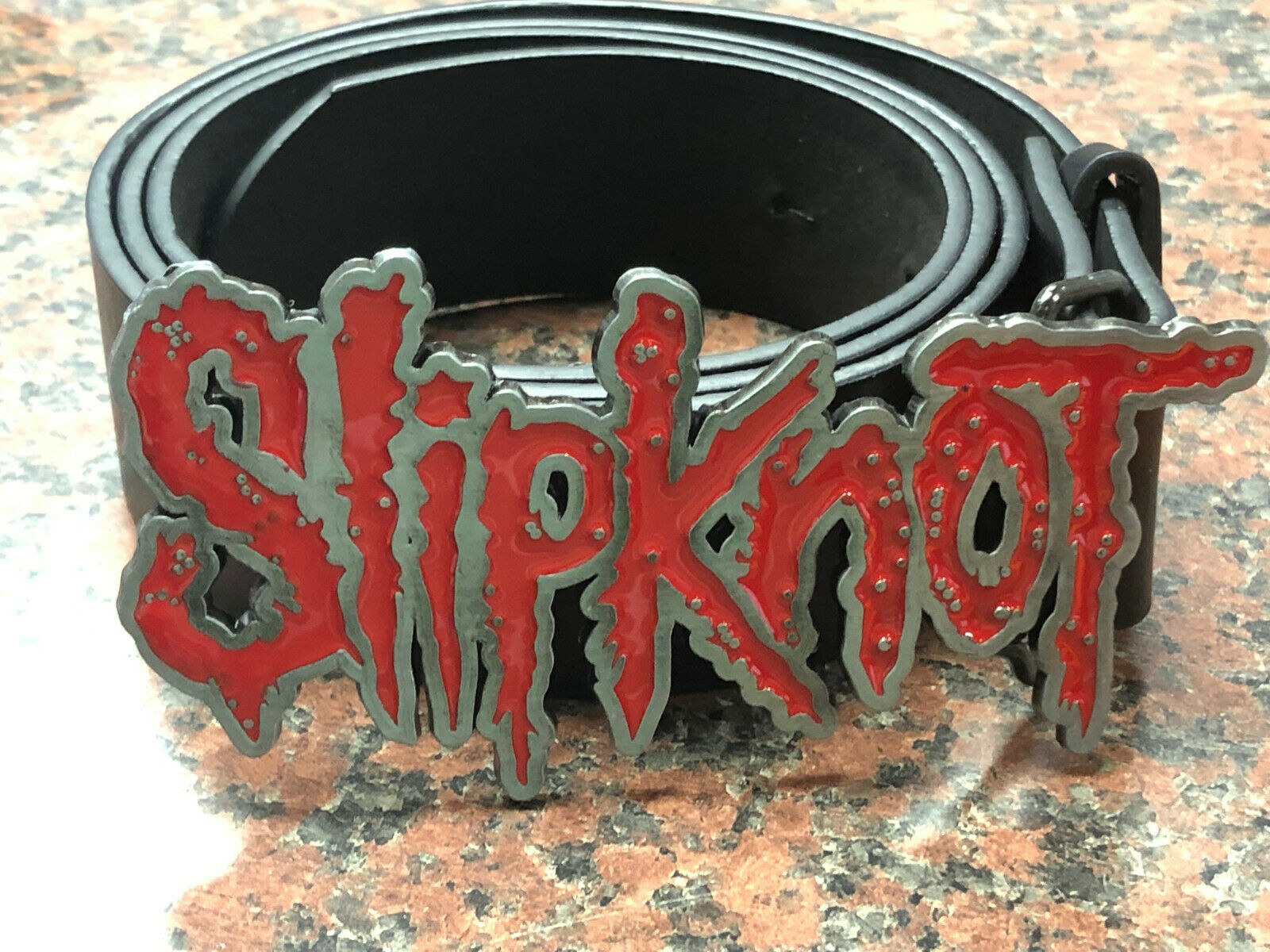 belt with a large Slipknot buckle