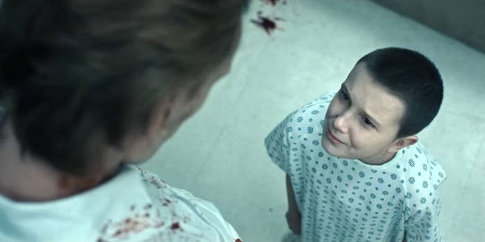 An overhead shot of Eleven in a flashback that has been digitally altered to make her look as young as she was in Season 1