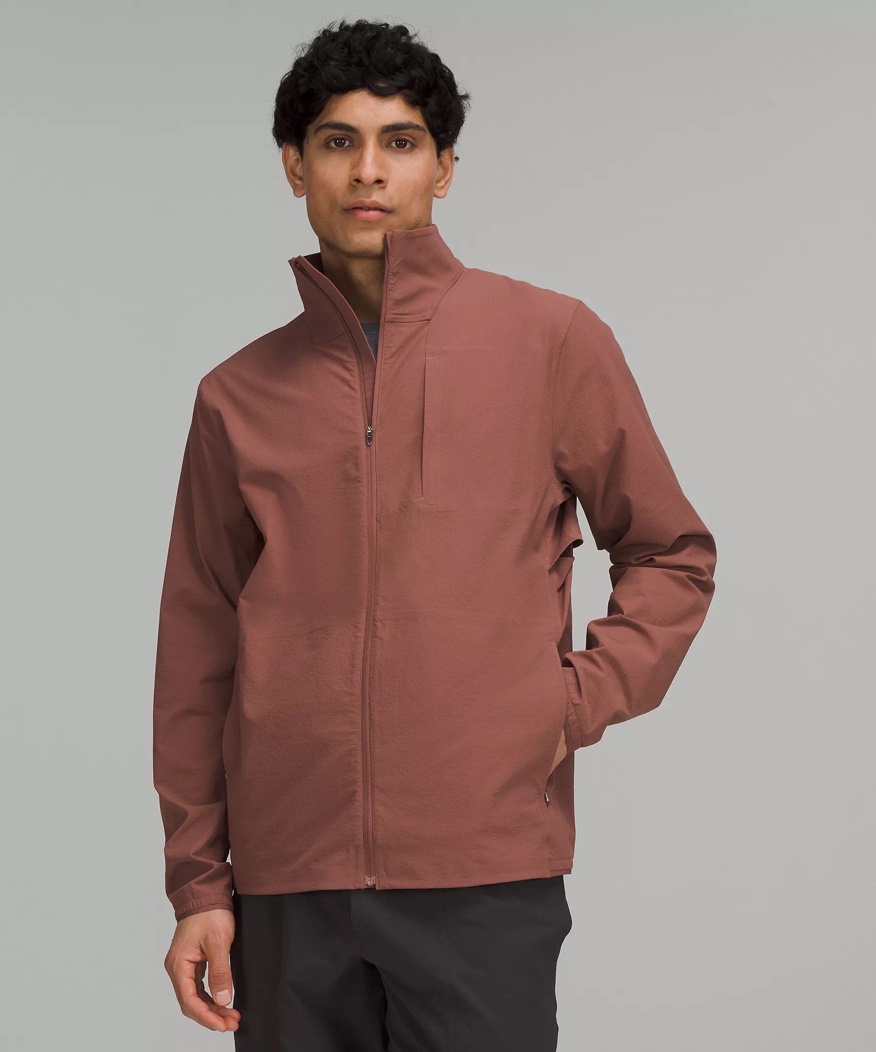 a person wearing the water-repellant jacket