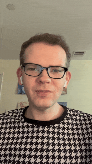 Gif of BuzzFeed writer Daniel Boan switching frames on Pair glasses