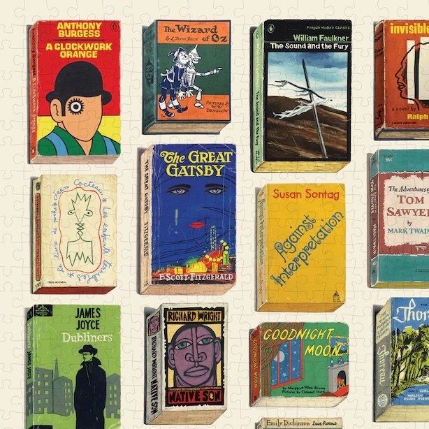 the completed puzzle showing dozens of classic paperback novel covers