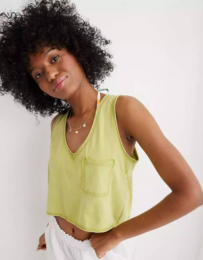 A model wearing the tank top in the color Tomboy Green