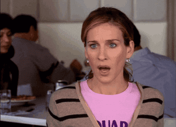 A woman blinking in confusion