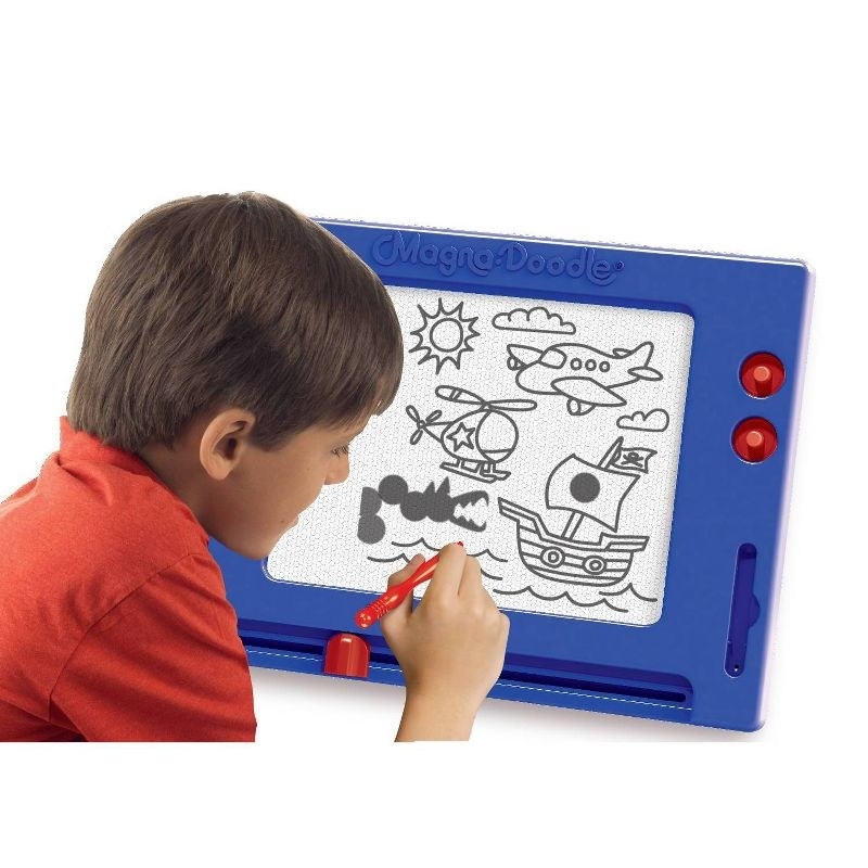 Kid with Magna Doodle