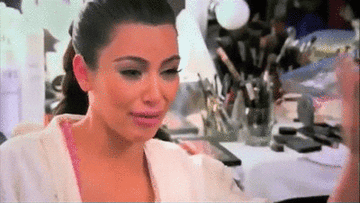 Kim Kardashian crying while explaining her divorce