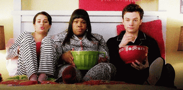 Rachel, Mercedes, and Kurt having a movie night together on &quot;Glee&quot;