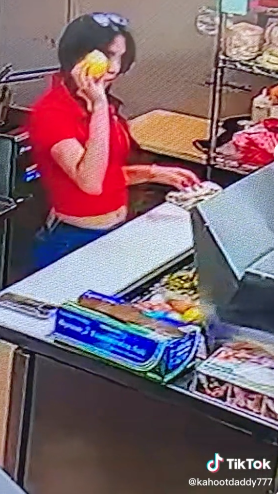 Jade at counter holding a lemon