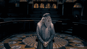 Professor Dumbledore from Harry Potter waiting impatiently