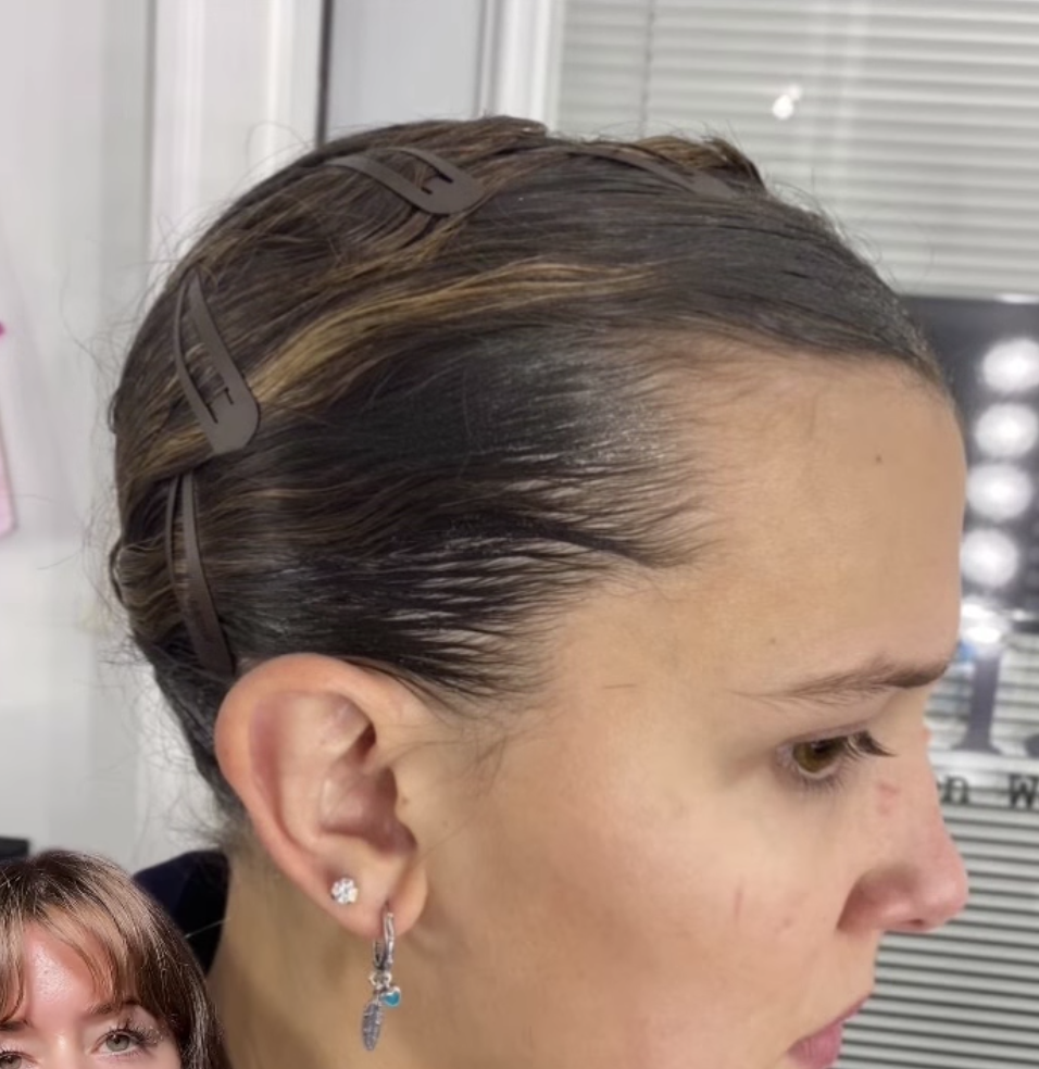 Close-up of Millie&#x27;s hair wrapped tight