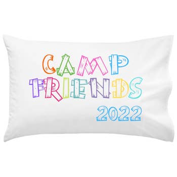 The white pillowcase featuring a camp motif