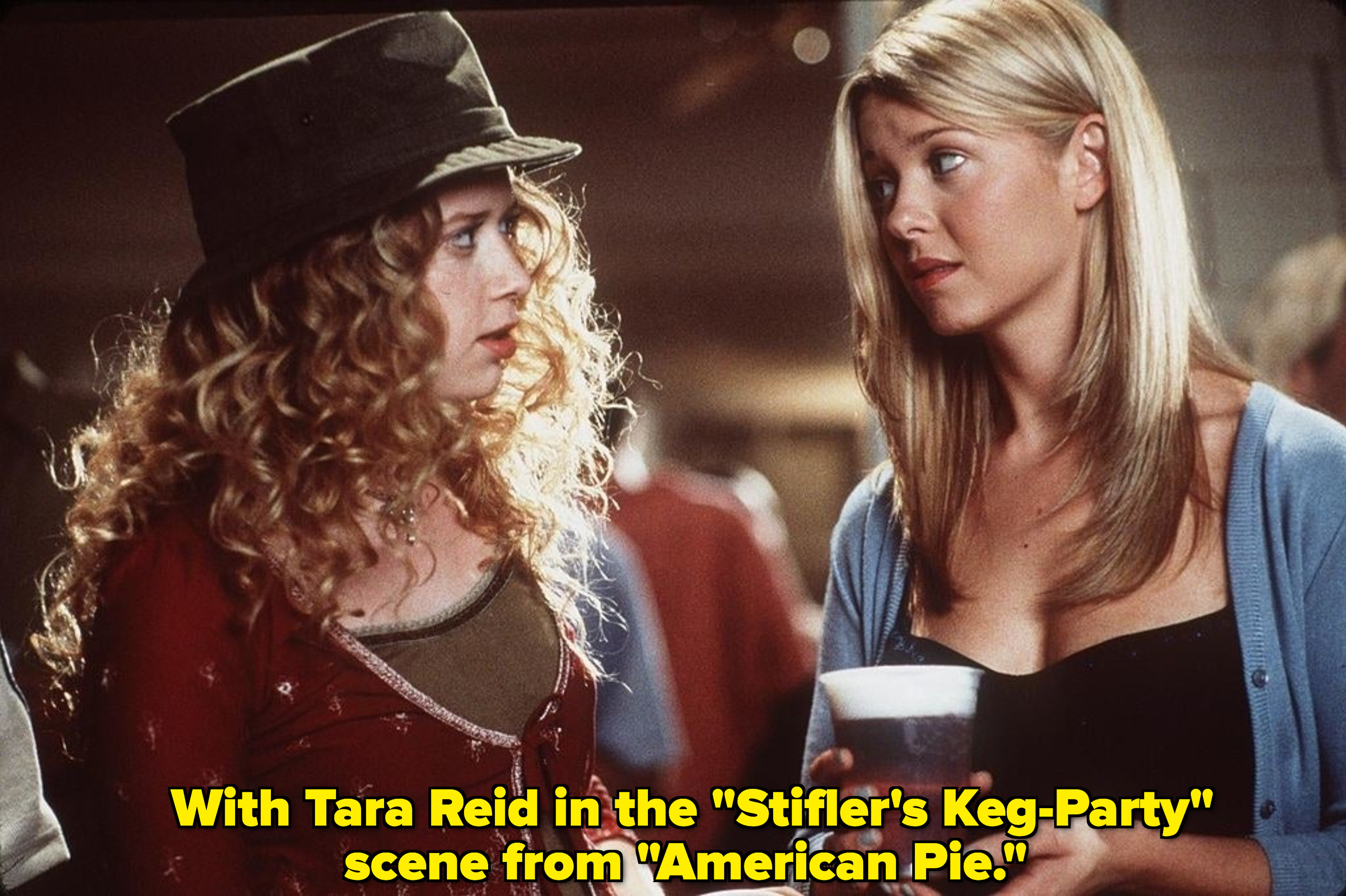 Lyonne and Tara Reid look at each other in a party scene from &quot;American Pie&quot;