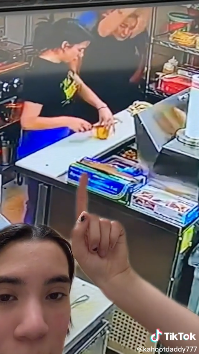 Jade at the counter cutting lemon in half