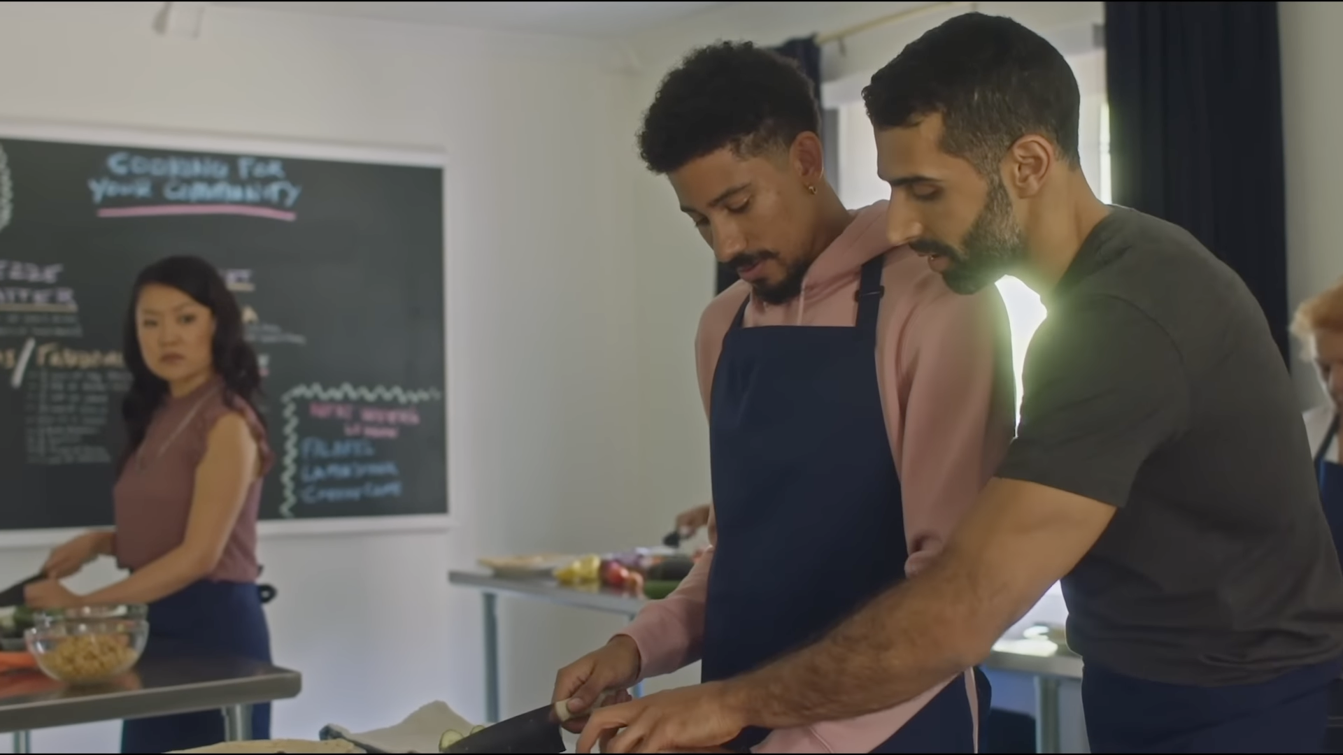 Rafi teaches Andrew how to chop a cucumber in &quot;My Fake Boyfriend.&quot; 