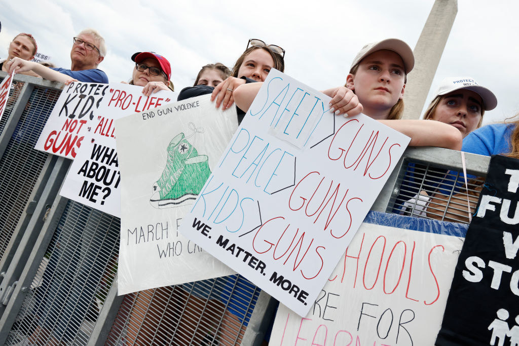 gun protest sign