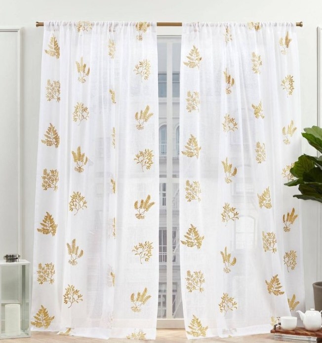 White and gold sheer drapes