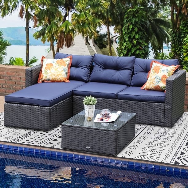 furniture in blue color next to pool