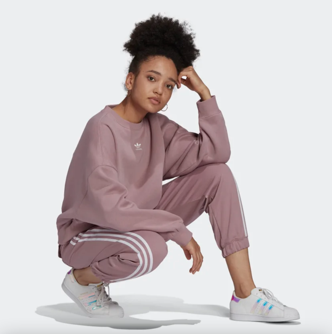 model in a pink sweatsuit