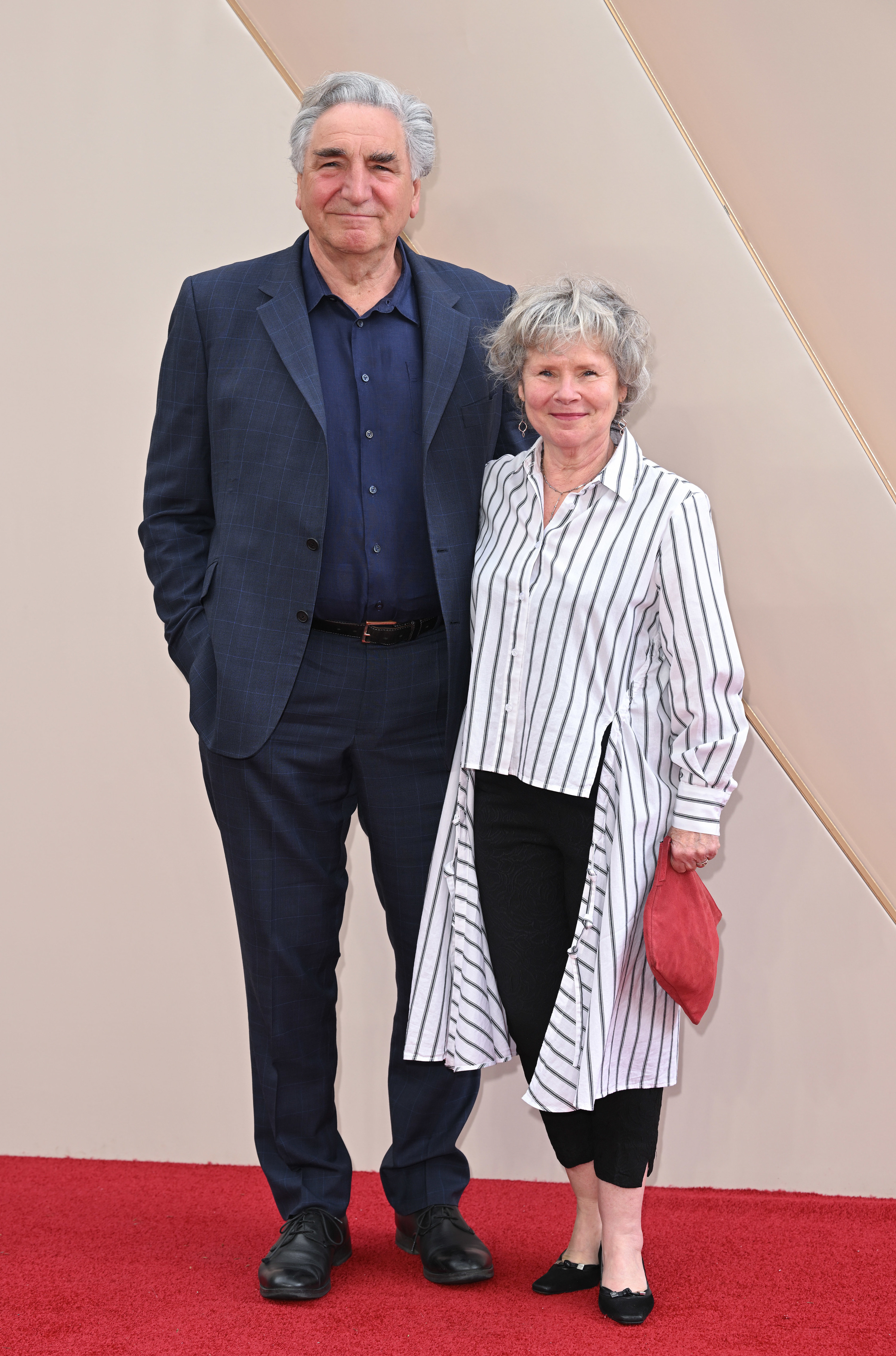 Jim Carter with his wife at a premier event