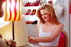 Alicia Silverstone trying to work a computer