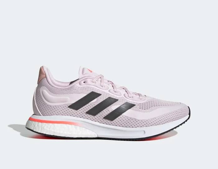 the light pink sneaker with three black stripes