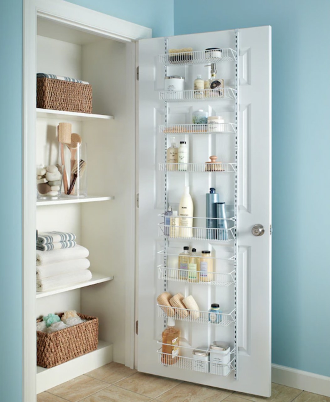 the over-the-door organizer filled with bathroom supplies