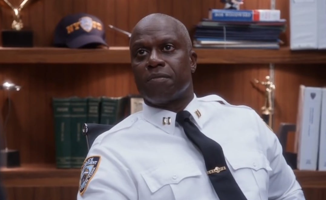 Holt sitting at his desk in &quot;Brooklyn Nine-Nine&quot;