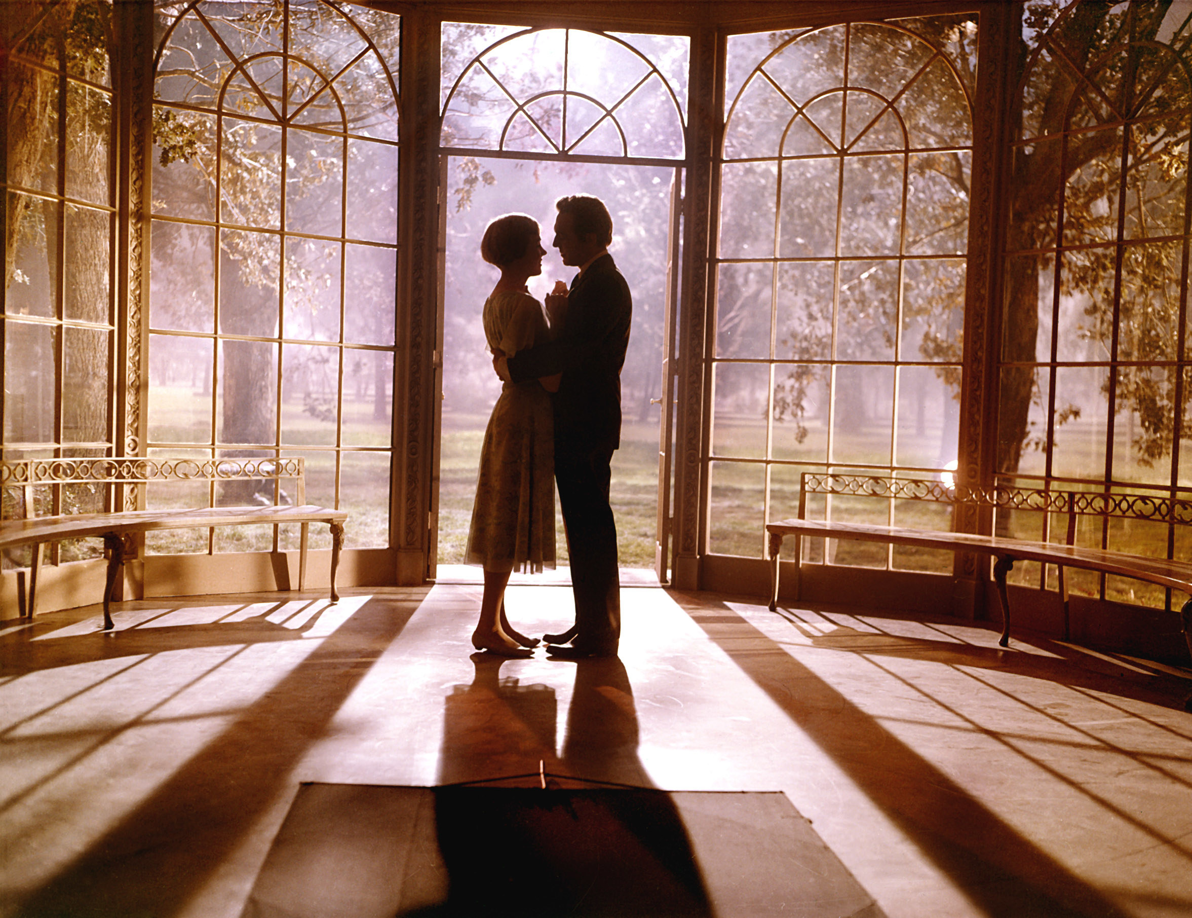 Julie Andrews and Christopher Plummer standing in a gazebo