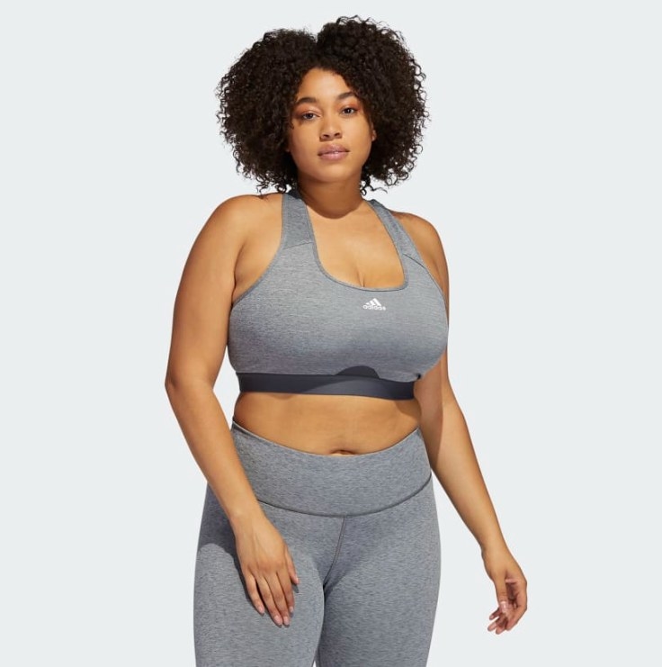 a model wearing the gray sports bra and matching leggings