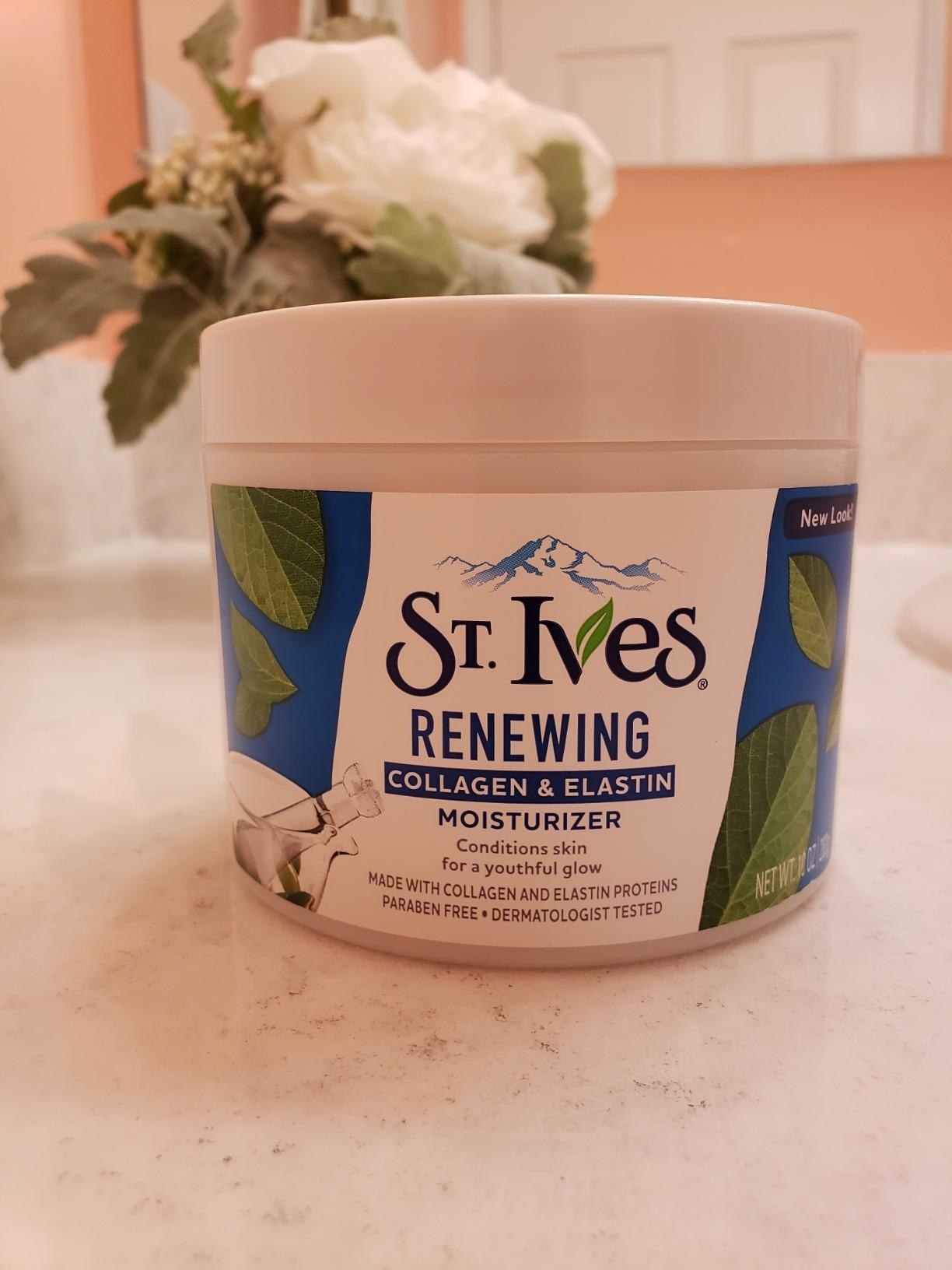 reviewer photo of the tub of face cream