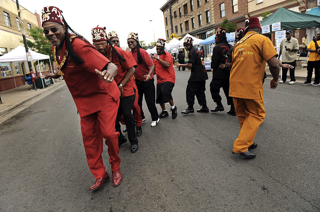 A group of line dancing men